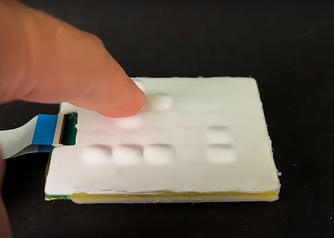 Cercetătorii au creat un ecran OLED cu tastatură gonflabilă. VIDEO Cercetatorii Au Creat Un Ecran Oled Cu Tastatura Gonflabila Video
